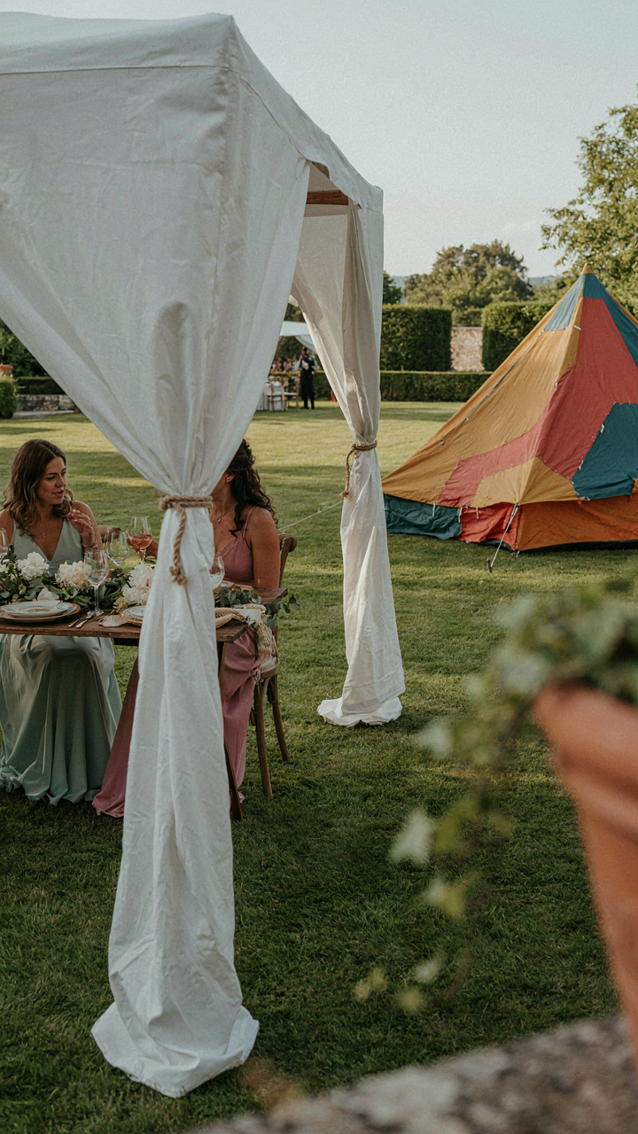 An elegant garden party canopy stands next to a mismatched pop-up tent.