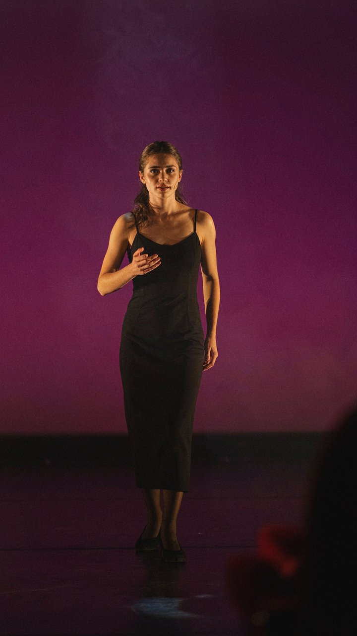 A stage uses key, fill, and accent lights to illuminate a performer.