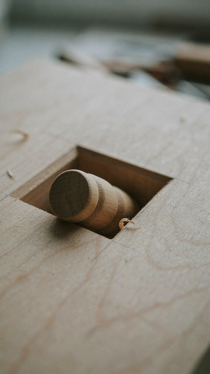 A round peg trying to fit into a square hole.
