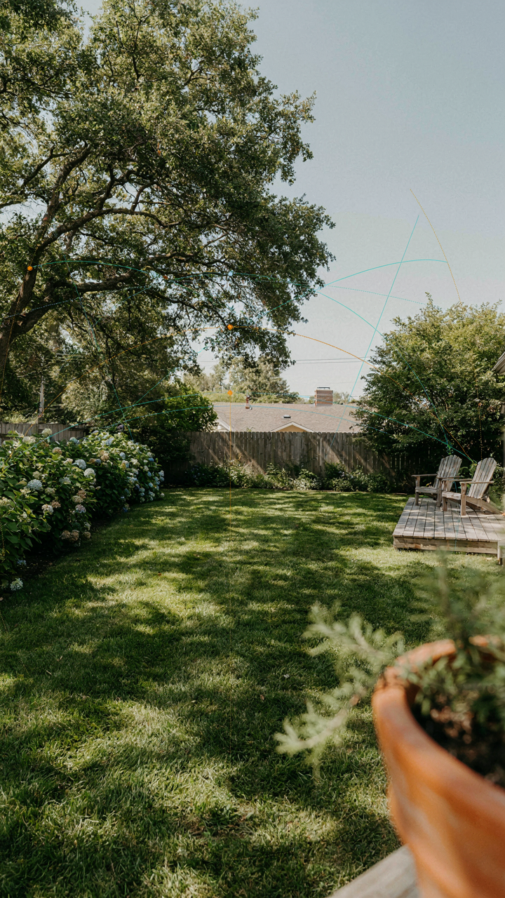 A diagram shows the sun's path over a green backyard.