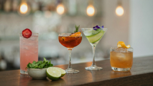 A collection of mocktails, each with unique and sophisticated mocktail garnish ideas.