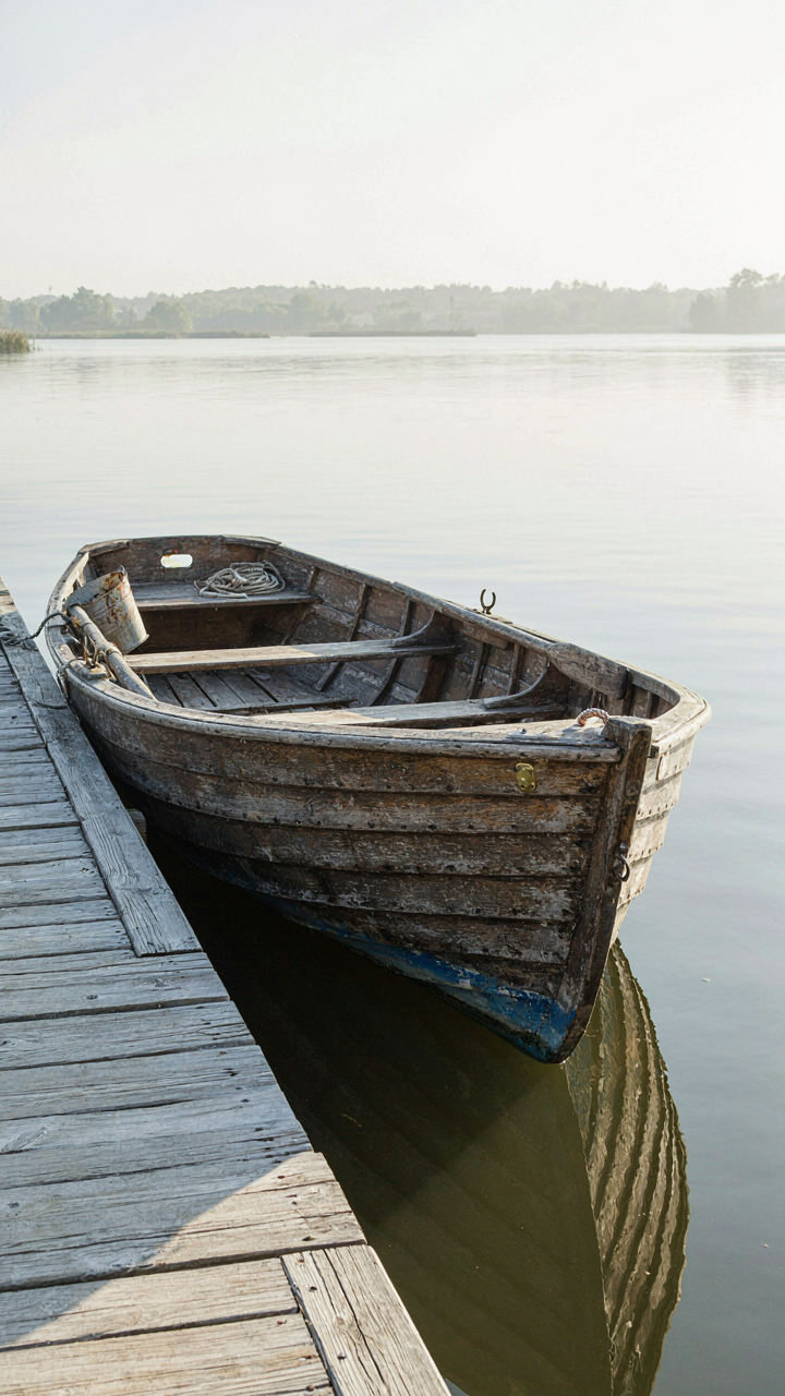 A strong wooden boat looks good even after being in the weather.