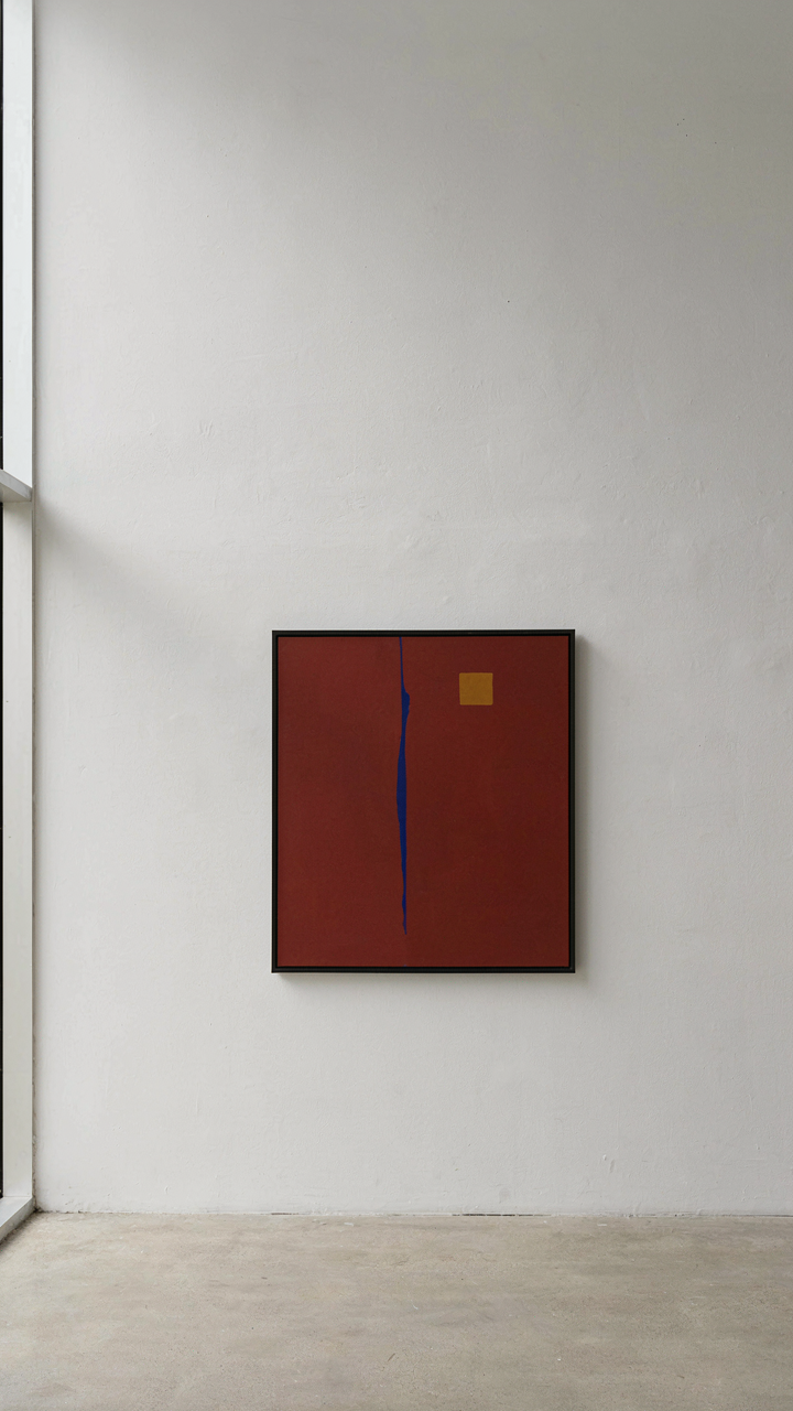 A single, abstract painting hangs perfectly centered on a wide, white gallery wall.