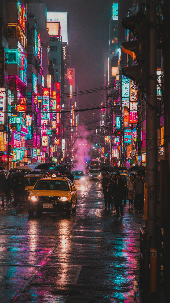 A busy city street at night with too many bright, competing neon signs.
