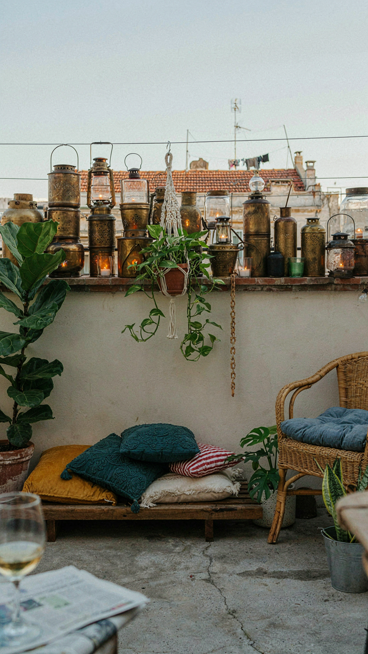 A small, cluttered patio overflowing with too many decorative items.
