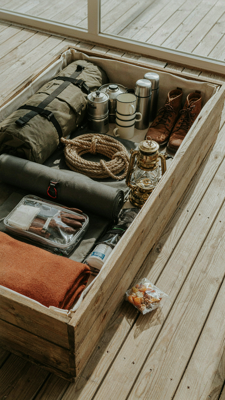 A shallow camping storage bin displays all its contents clearly and accessibly.
