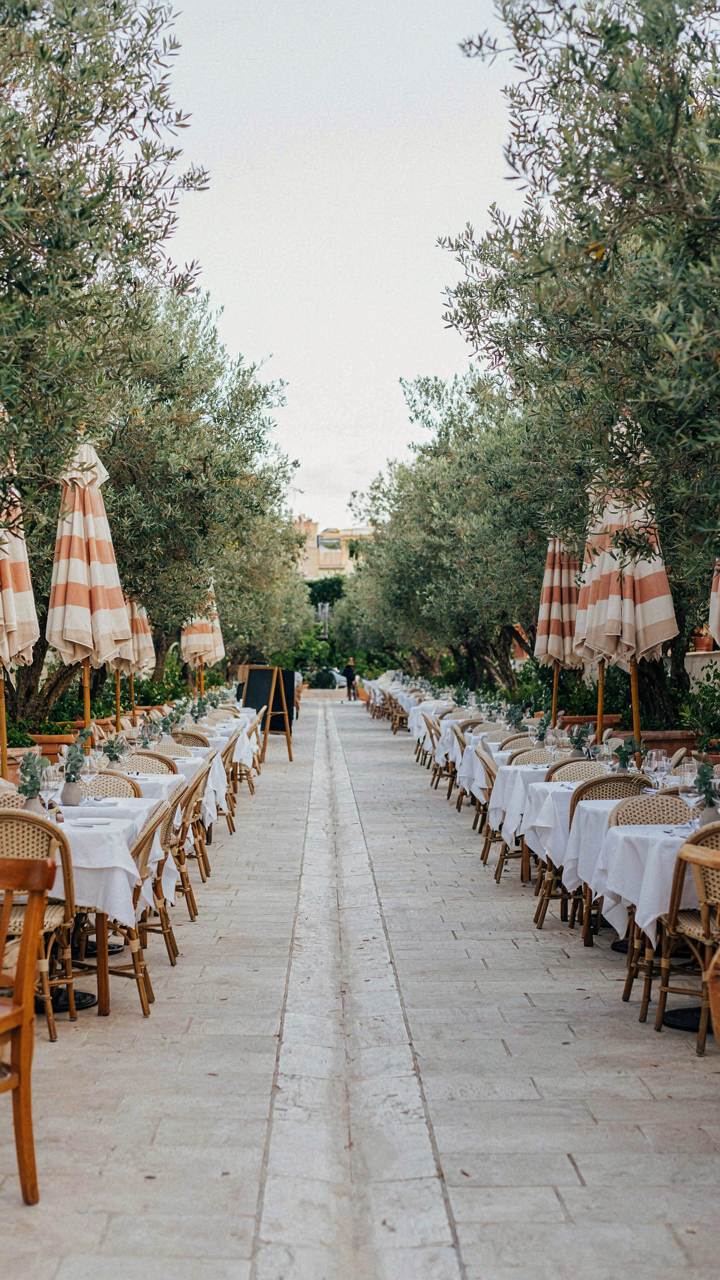 A clear, wide path around an outdoor dining table.