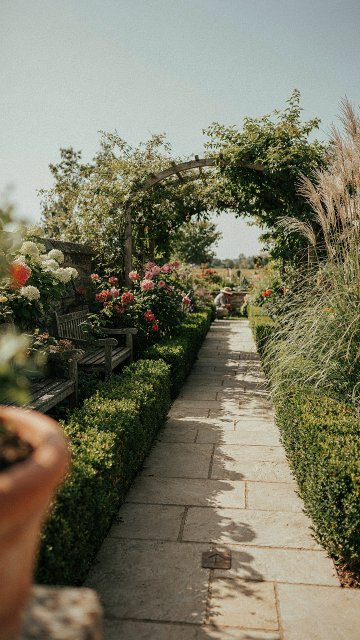 Subtle signs and pathways guide people through a garden.