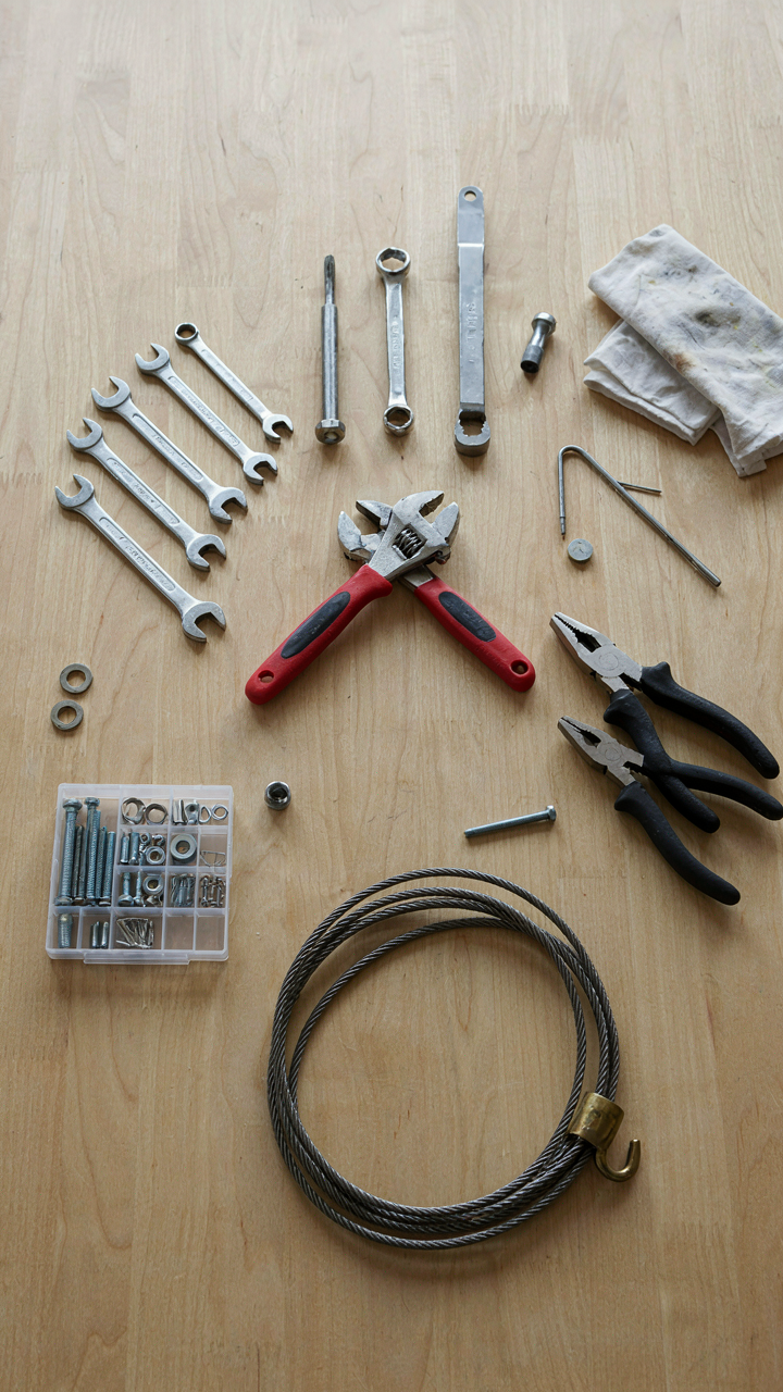 A well-organized toolkit for an overland trailer build.