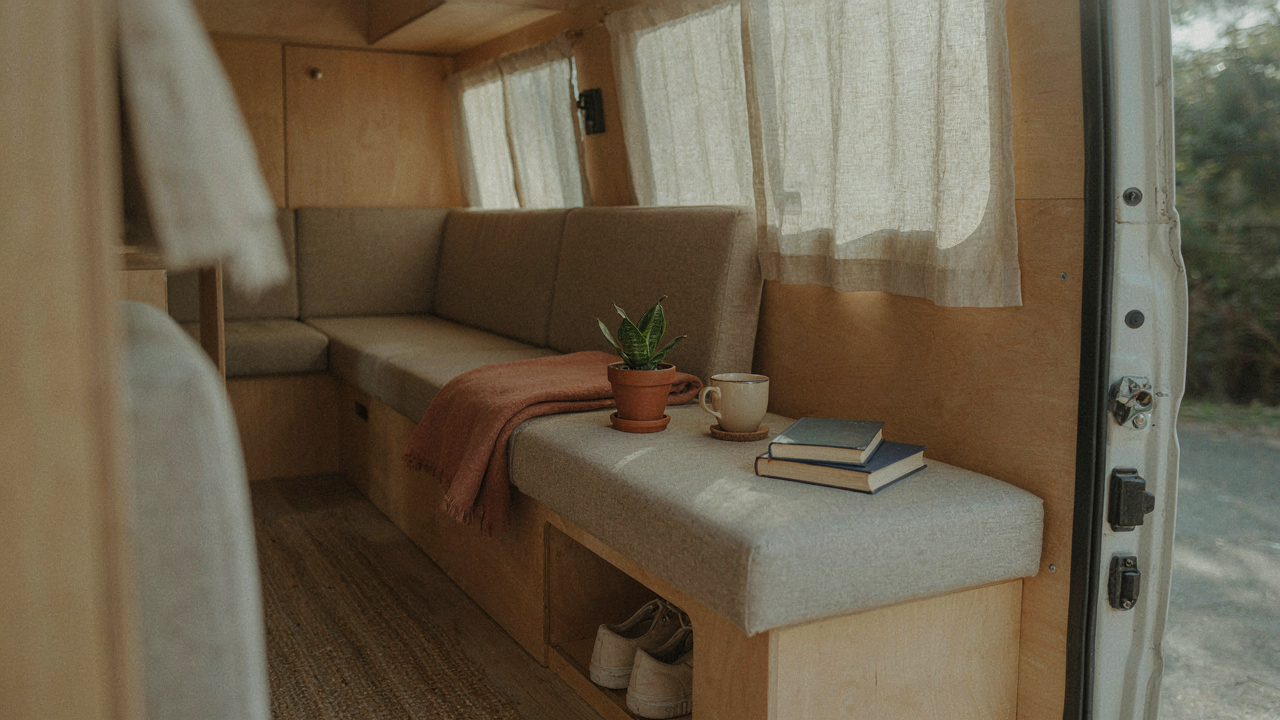 A well-organized van interior with clever storage for van life.